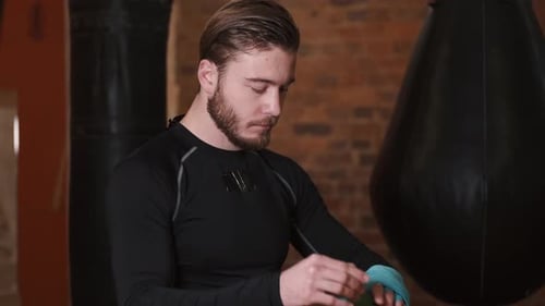 Man Wrapping His Hand for Boxing