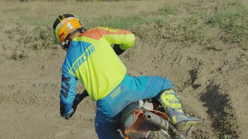 Motocross riding and leaving mud behind