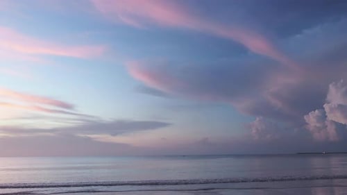 Beautiful Sunset at the Beach, Amazing Colors, Light Beam Shining Through the Cloudscape