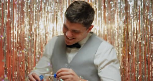 Man Blowing Bubbles at Party Celebration Indoors