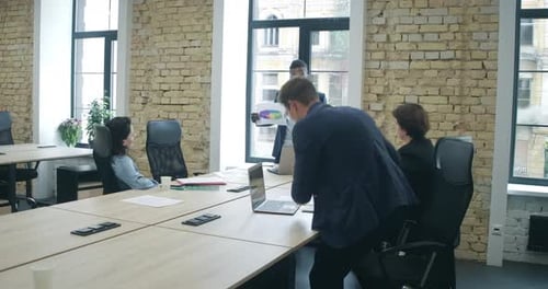 Business Presentation in Modern Office Setting