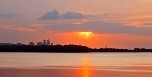 Dramatic Skyline Sunset Reflecting on Calm Waters