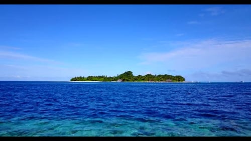 Aerial drone shot nature of paradise bay beach time by turquoise lagoon and bright sandy background