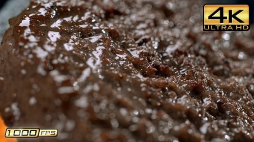 Close-up Juicy Burger Patty Cooking in a Pan