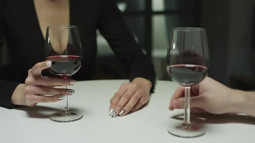 Touching a woman's hand on a date