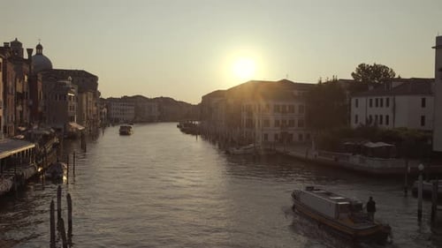 Boat cruising waters in Morning Canal Grande, Venice, Italy