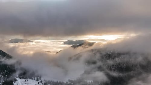 Mountains Emerging from Winter Fog at Sunrise