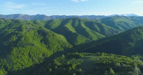 Aerial View of Beautiful Serene Green Hills and Mountain Tops in the Spring