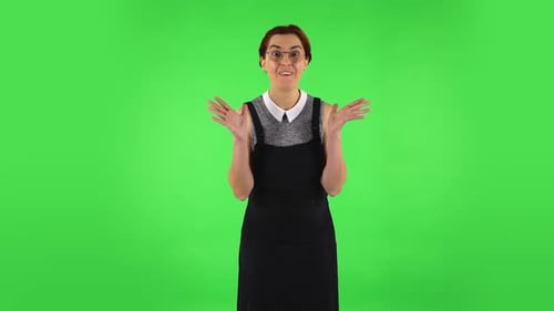 Funny Girl in Round Glasses with Wow Face Expression. Green Screen