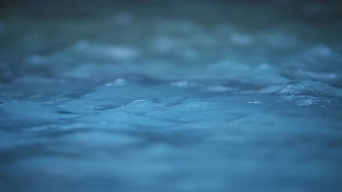 Calm blue surface of fountain water