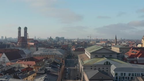 Frauenkirche Cathedral in Classic Munich Old Town Looking Over Cityscape, Aerial Drone Flight