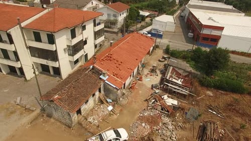 Aerial View of Construction Workers on Roof