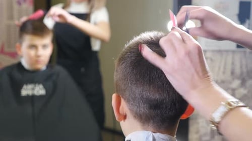 Boy Gets Haircut at Salon