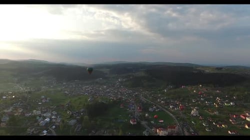 Above the Small Town Is Flying Balloon. Aerial View