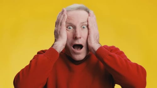 Senior Man Reacts with Shock and Surprise