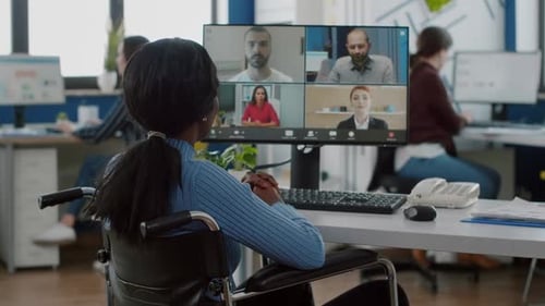 Woman in Wheelchair Attends Virtual Business Meeting