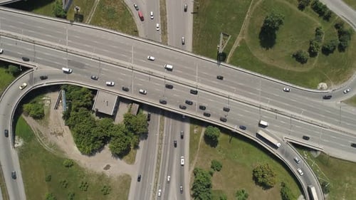 Top down aerial view of Road junction with car traffic in a city. 10