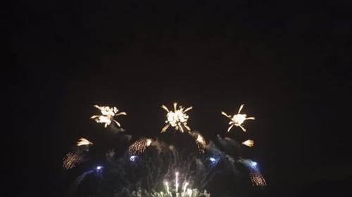 International fireworks festival display at night. Variety of colorful fireworks in holidays