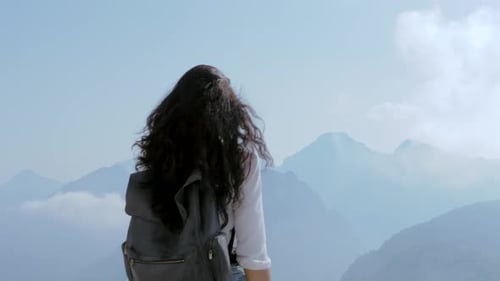 Woman Hiker Enjoying Scenic Mountain View