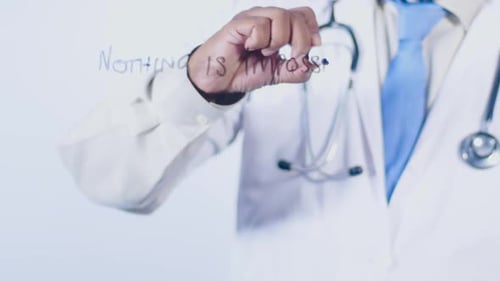 Doctor Writes 'Nothing is Impossible' on Glass
