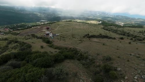 Top View of Green Hills with Rocks