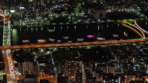 Timelapse Tokyo Boats Arrive and Depart Reflecting in River