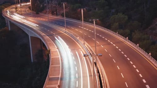 Night timelapse of cars on highway