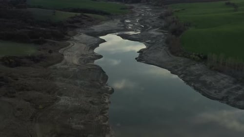 Aerial View Of Half Empty Reservoir