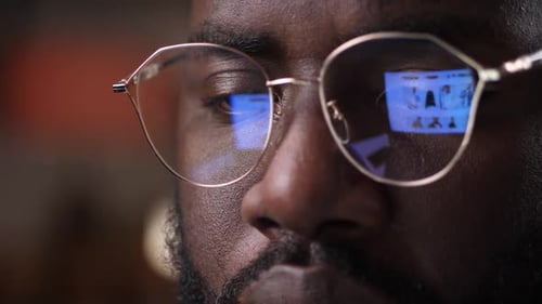 Glasses of Shopping Man with Reflection of Website