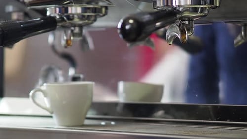 Close Up Video of Pouring Coffee Stream From Professional Machine in Cup