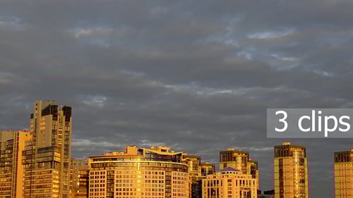 Time Lapse of Clouds Over a Modern City