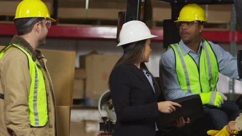 Portrait of industry workers in shipping warehouse