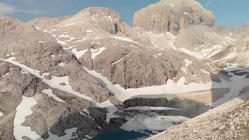 Aerial Shot Unveiling Mountain and Alpine Lake Antermoia in Dolomites Italy