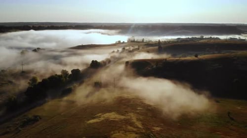 Foggy Rural Landscape at Sunrise Aerial View