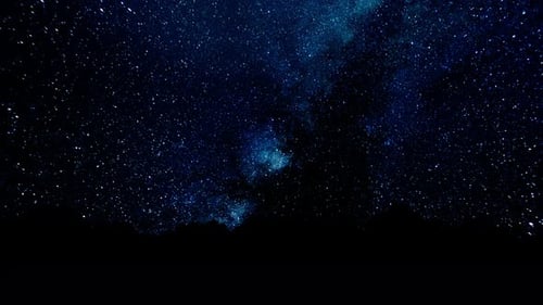 Animated Night Sky with Shimmering Stars and Blue Nebula