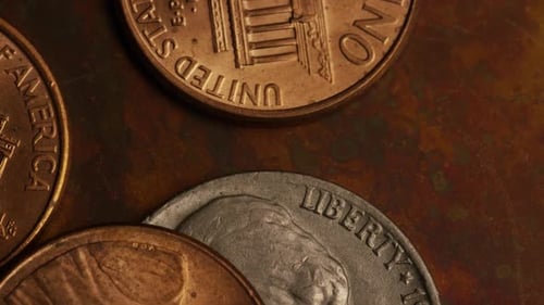 Rotating stock footage shot of American monetary coins - MONEY 0340