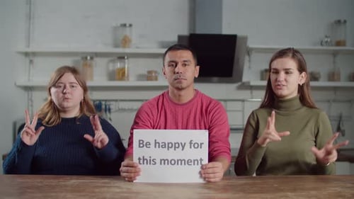 Adults Communicate Using Sign Language and Text Signs