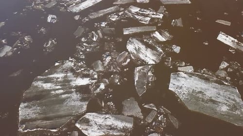The Ice Floes Floating on the River. The Ice Drift in Spring Time