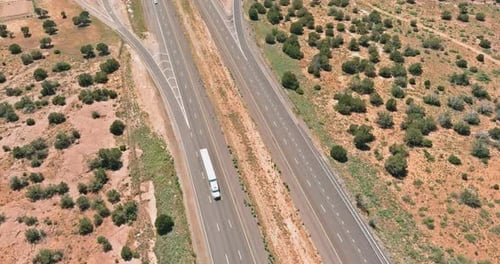 Horizontal Panorama Trucks Stop on Rest Area Near Interstate Highway in Desert Arizona
