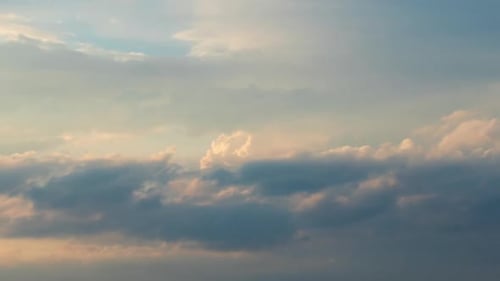 Moving White and Yellow Clouds Shot in Time-lapse. Idyllic Cloudy Heaven Background. Timelapse of