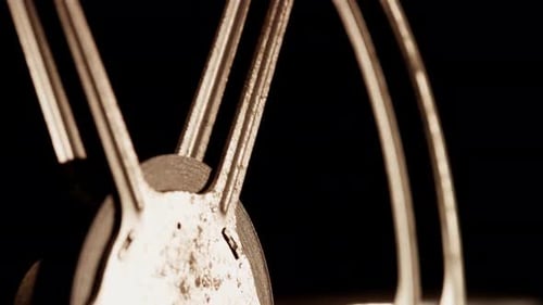 Vintage Film Reel Spinning in Sepia