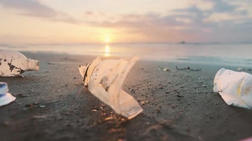 Plastic Debris on Ocean in Sunset As Something Beautiful Environmental Disasters