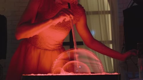 Cute Girl Blows a Few Soap Bubbles, One in the Other, Makes a Show, Close-up