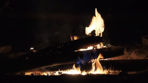 Bonfire Burning at Night in Slow Motion. Flames of Campfire at Nature.