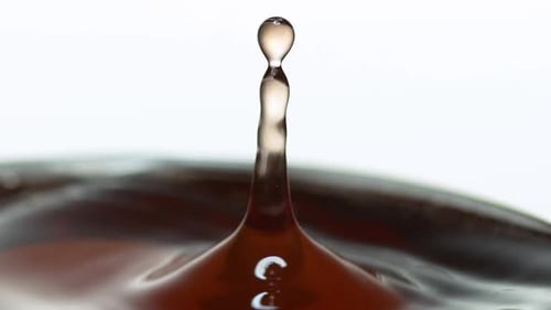 Liquid Drop Impacting Surface Creates Abstract Ripple