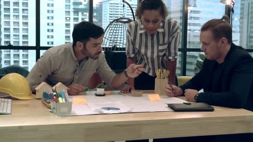 Creative Business People Group Having Conversation at Office Desk in Workplace