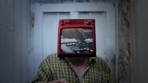 Man with Television Head Shows Music Production Equipment