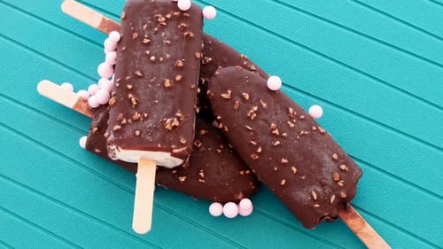 Chocolate Nut Ice Cream Bars on Turquoise Surface