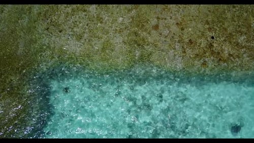 Aerial abstract of beautiful lagoon beach time by blue lagoon and white sand background of a dayout