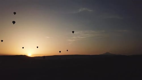 Hot Air Balloons Hover Over the Valley